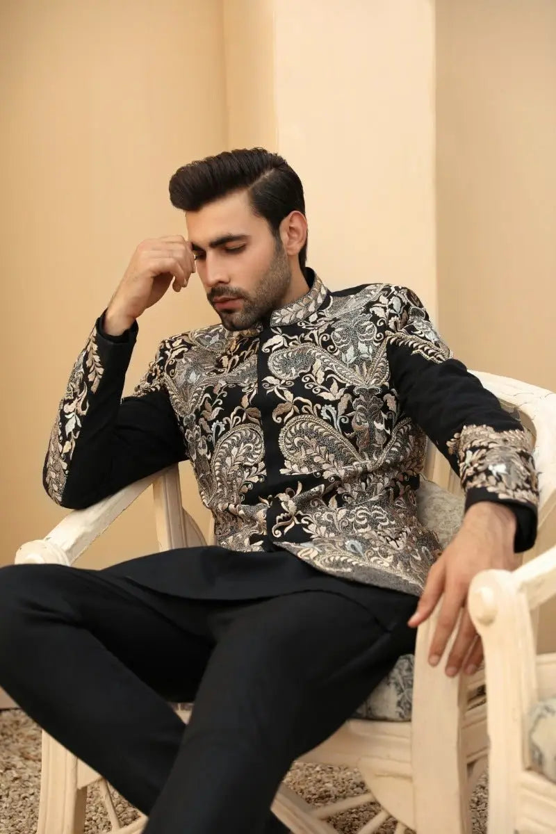 Black and silver embroidered formal prince coat with intricate paisley patterns from ahsan tariq raqeeb se collection
