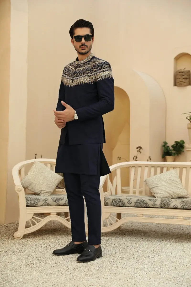 Navy blue embroidered kurta azraq with silver thread detailing on neckline and sleeves in prince coat silhouette from raqeeb se collection