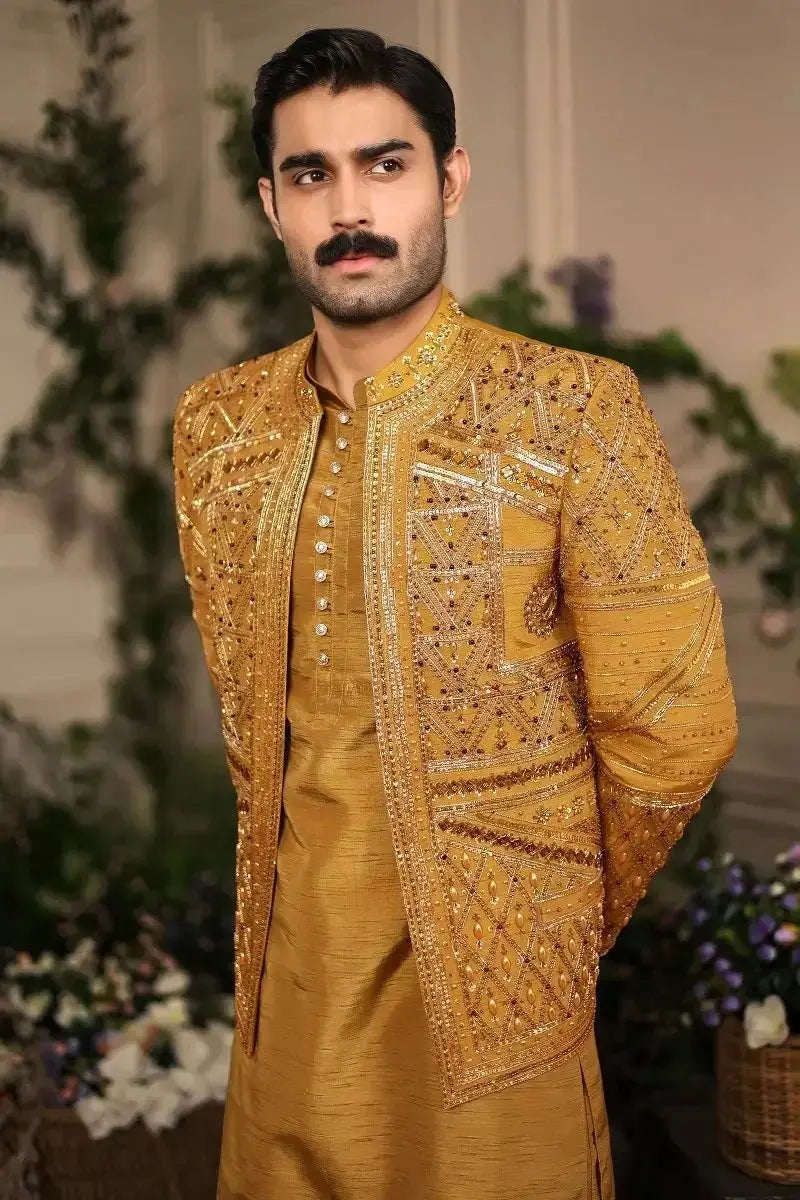 Golden embroidered nishan-e-manzil sherwani with intricate gold thread and beadwork in raw silk fabric