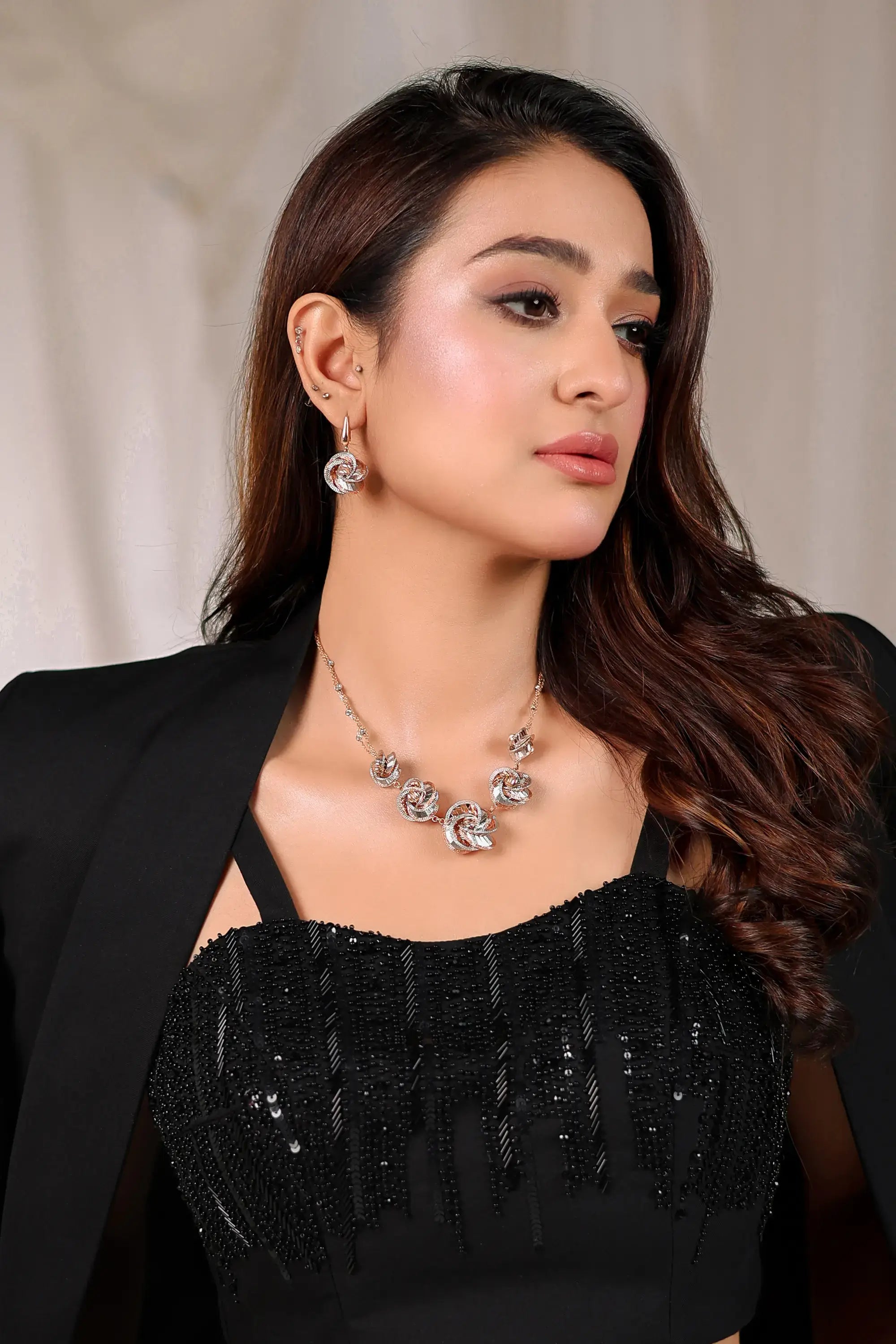Noir éclat silver rose-themed necklace with sparkling gemstone accents by ahsan tariq for sleek black style