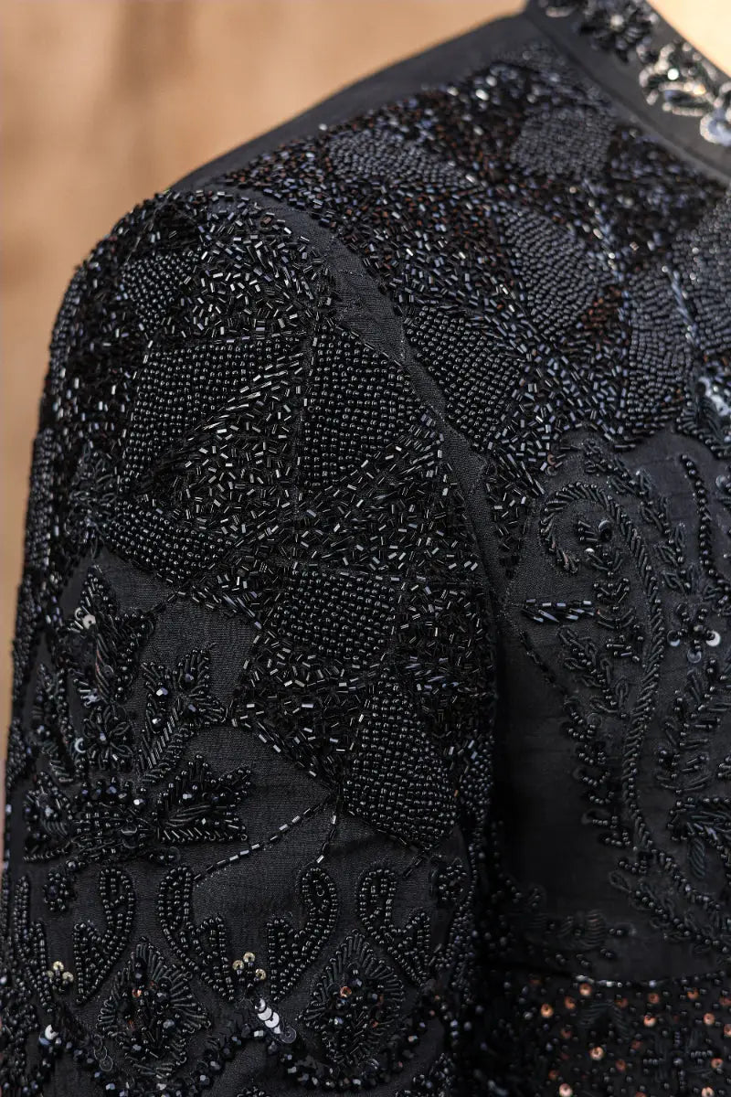 Black beaded lace dress with intricate floral embroidery and sequin accents from ahsan tariq ishq collection qara