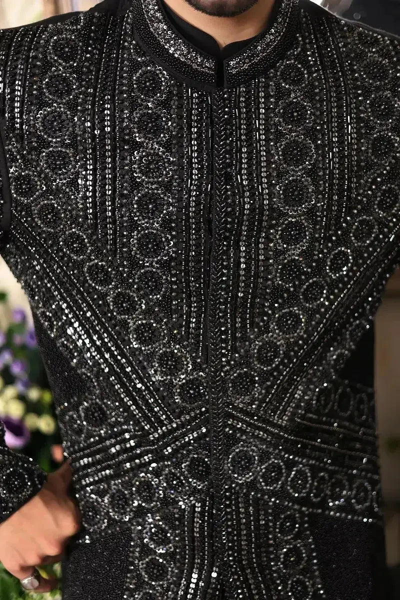 Black embellished sherwani with intricate silver sequin and beadwork geometric patterns ranjeet singh royal design