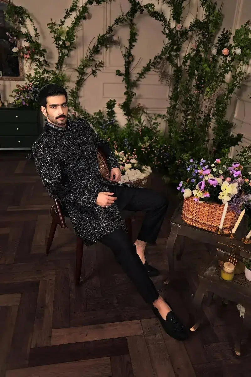 Black embroidered formal jacket with intricate silver thread detailing from ranjeet singh royal collection