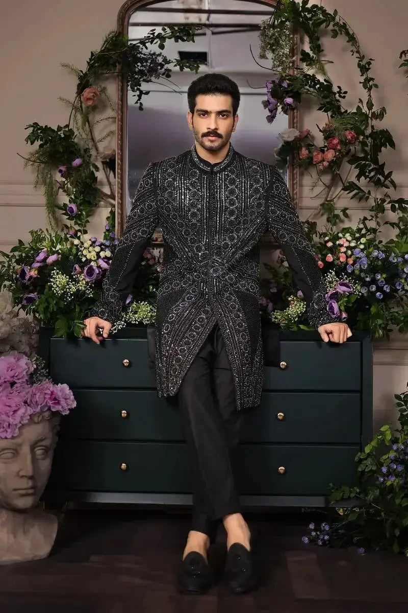 Black embroidered sherwani with intricate silver threadwork and high collar from ranjeet singh royal collection