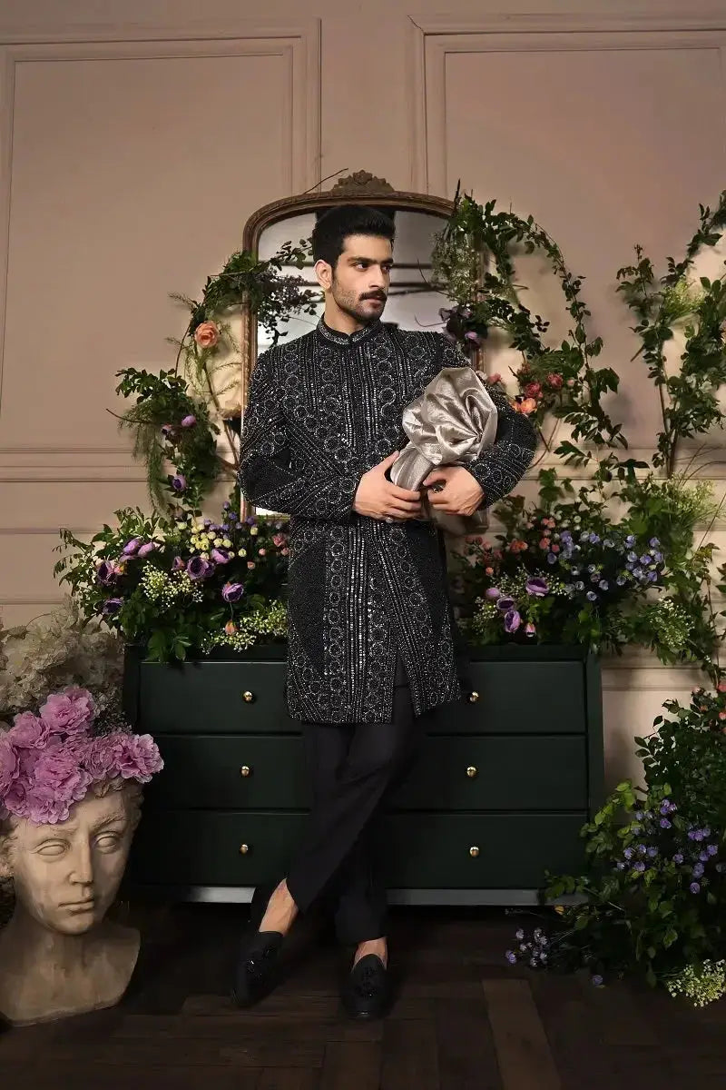 Black embroidered sherwani with silver thread detailing from ranjeet singh royal collection for festive occasions