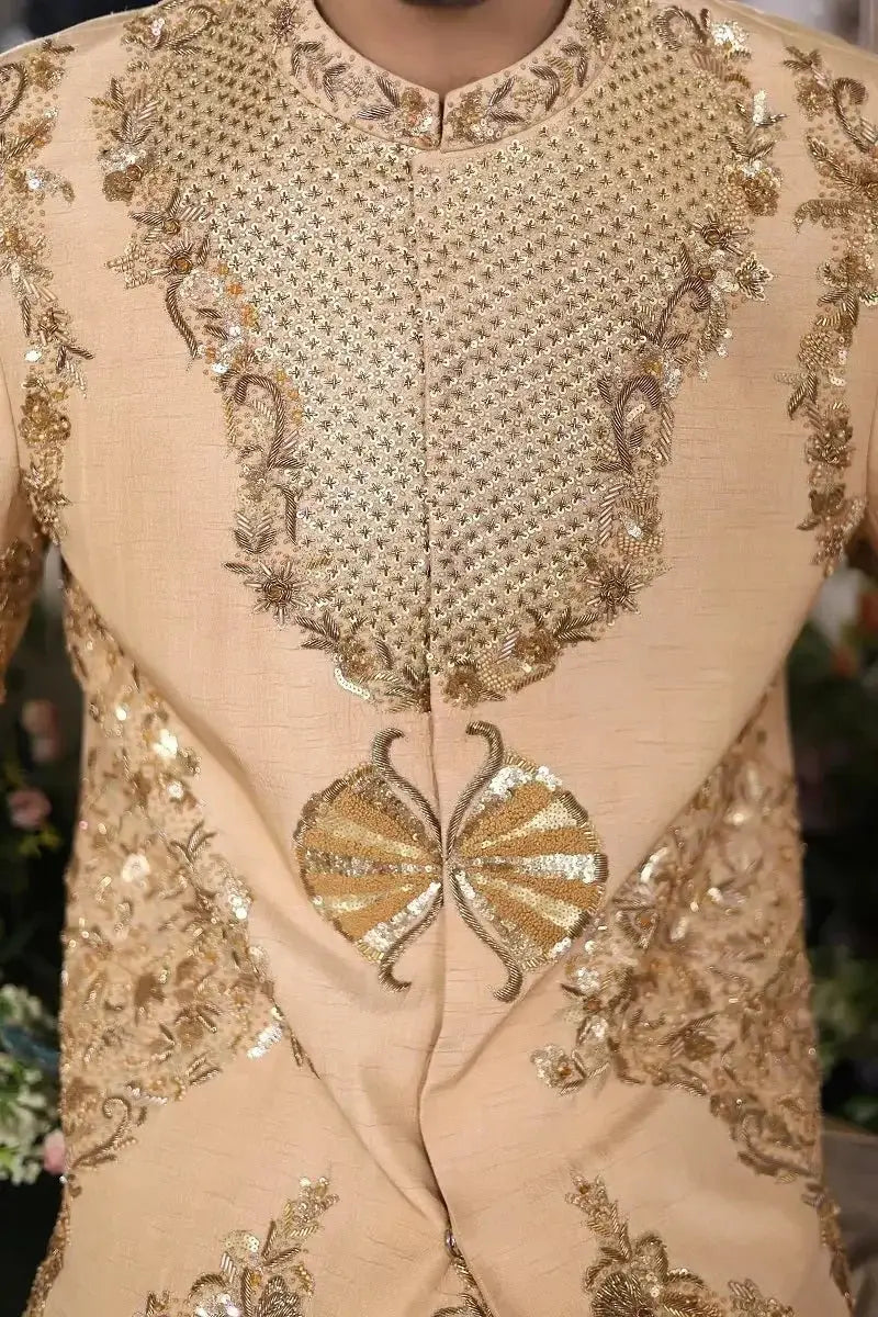 Beige silk sherwani shairshah with intricate gold embroidery and sequin work featuring a central butterfly motif