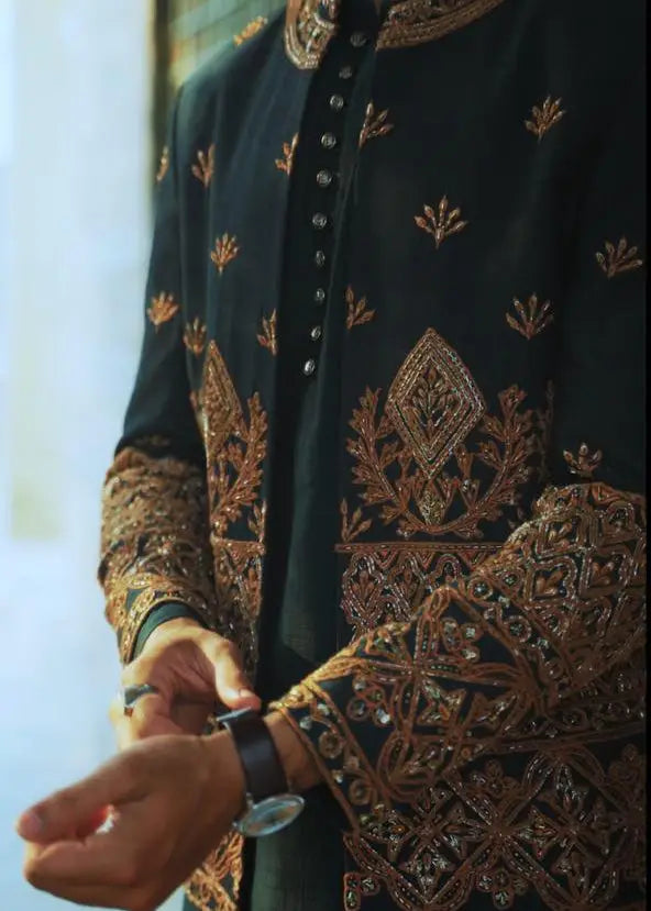 Black embroidered sherwani bagh-e-zar with intricate gold threadwork and sequin detailing for formal occasions
