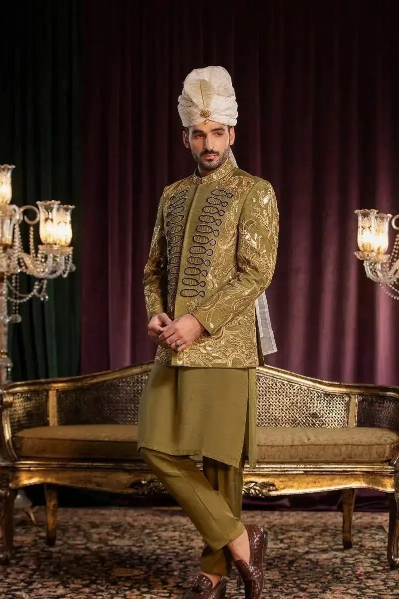 The davr sherwani features premium quality raw silk with intricate doori work in gold embroidery and black detailing