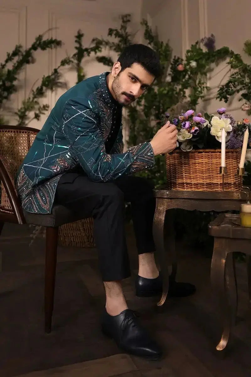 Teal sequined blazer fakhar-e-jahan with intricate geometric embroidery on front for elegant occasions