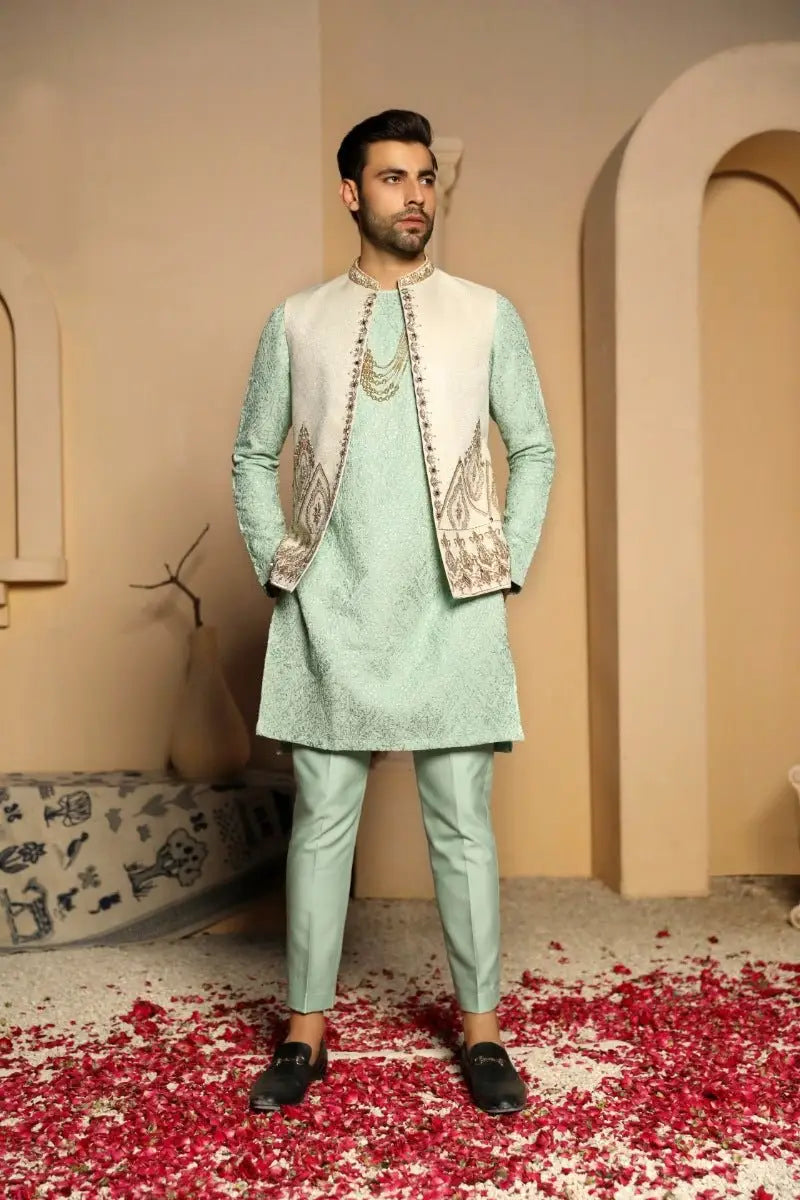 Light green embroidered sherwani gulistan with cream embellished front and cuffs by ahsan tariq prince coat collection