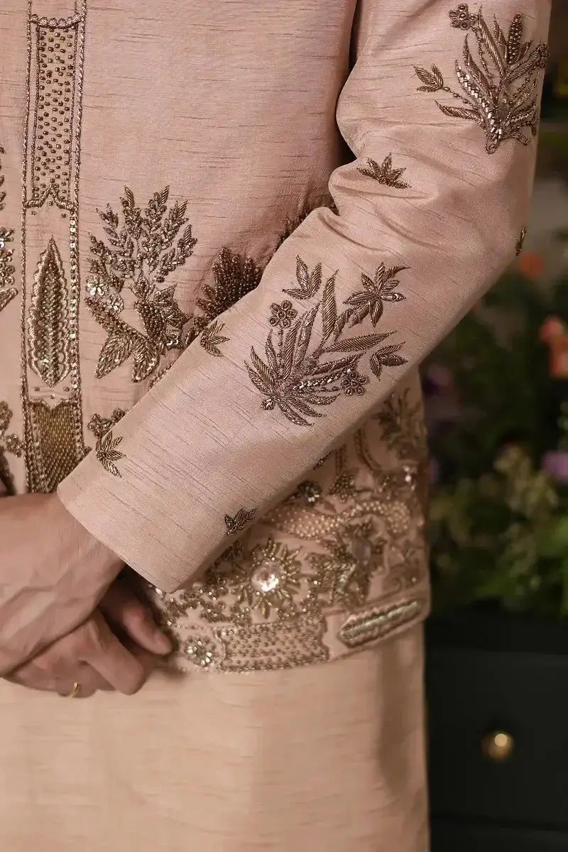 Beige raw silk kurta gulzar-e-raunaq with intricate gold and silver thread floral and leaf embroidery
