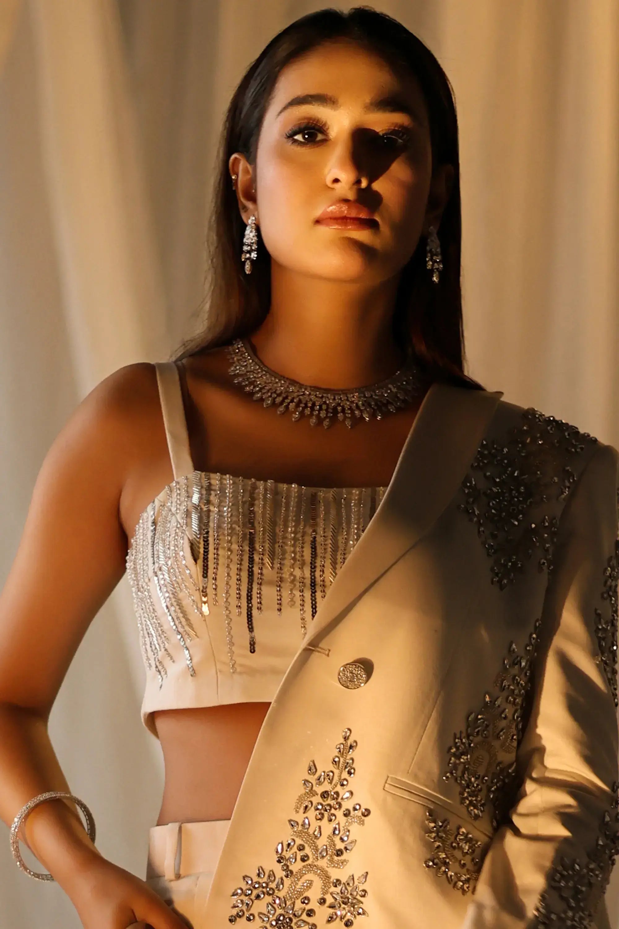 Ivory Radiance cream blazer by Ahsan Tariq with silver beading and embroidery for elegant formal wear