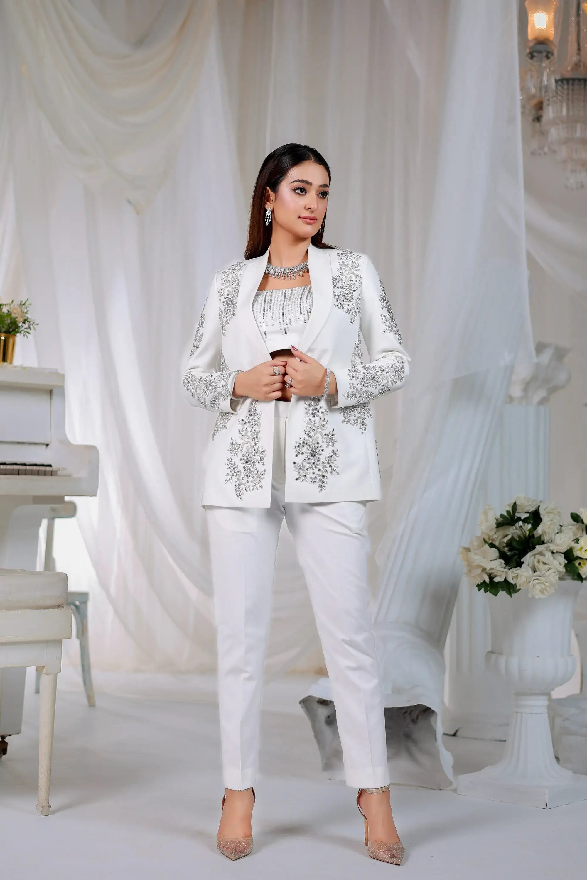 Ivory radiance white blazer with intricate silver embroidery on front and sleeves by Ahsan Tariq for formal wear