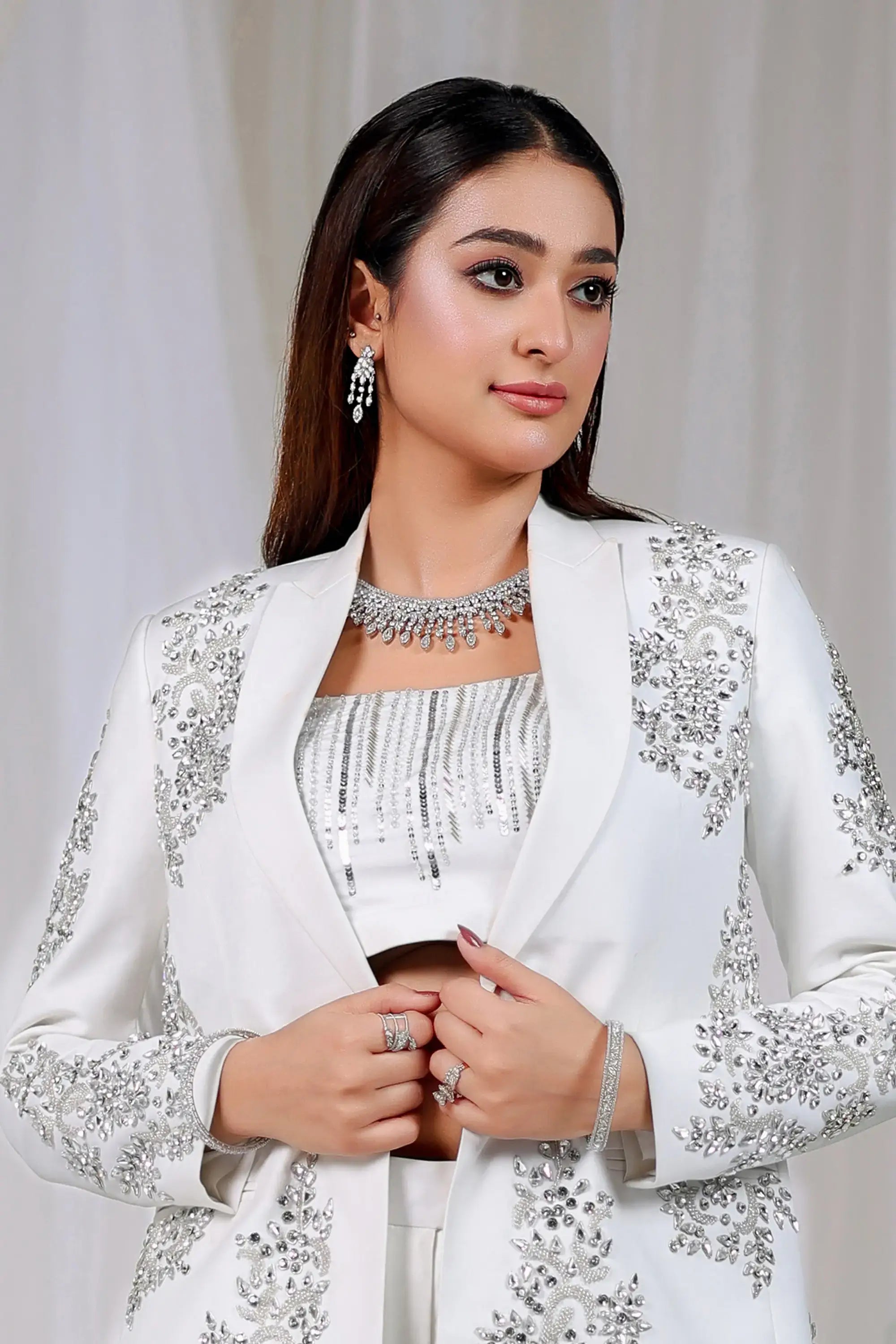 Ivory radiance white blazer with intricate silver beading and embroidery by Ahsan Tariq for formal wear