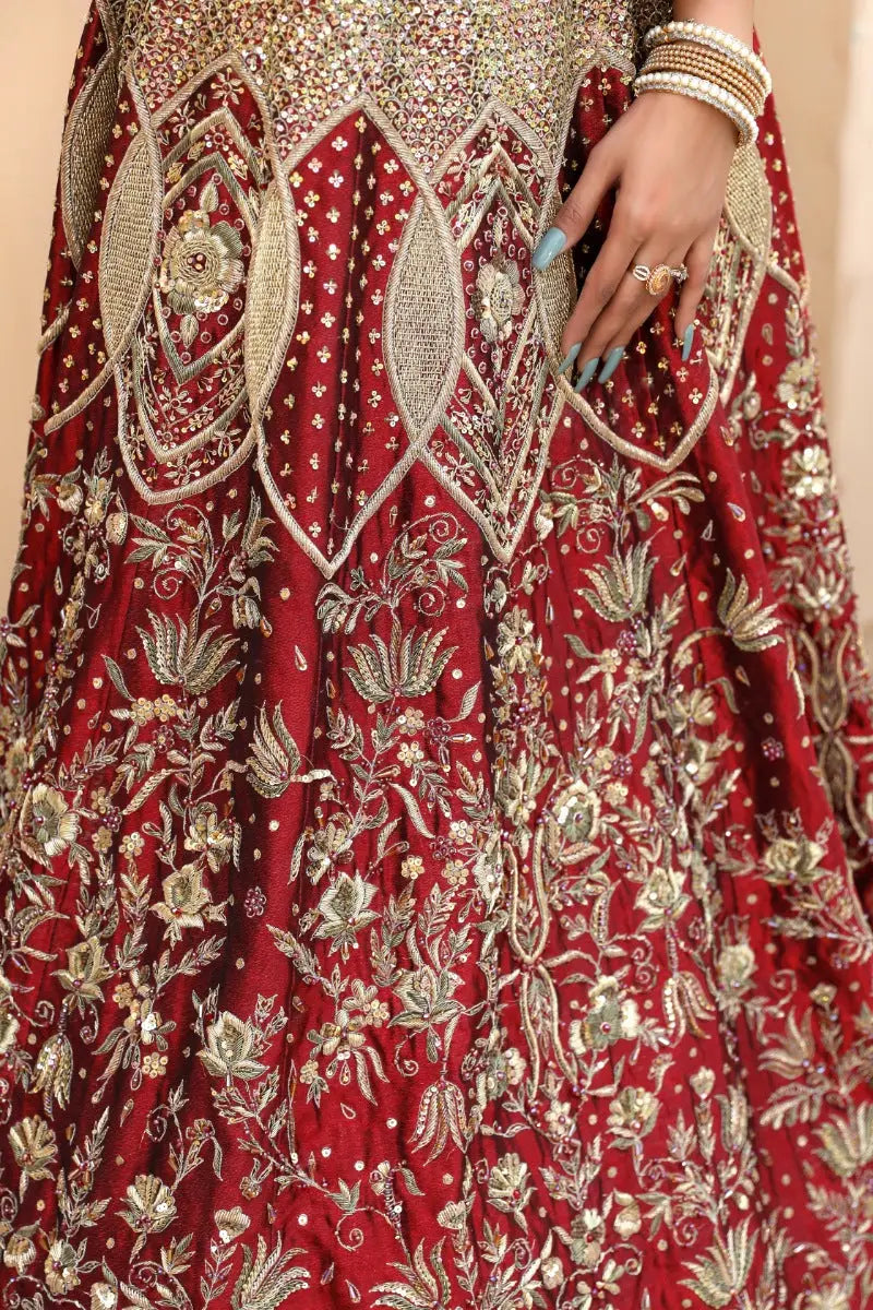 Malika rich red bridal lehenga skirt with intricate antique gold tilla embroidery in floral and paisley patterns
