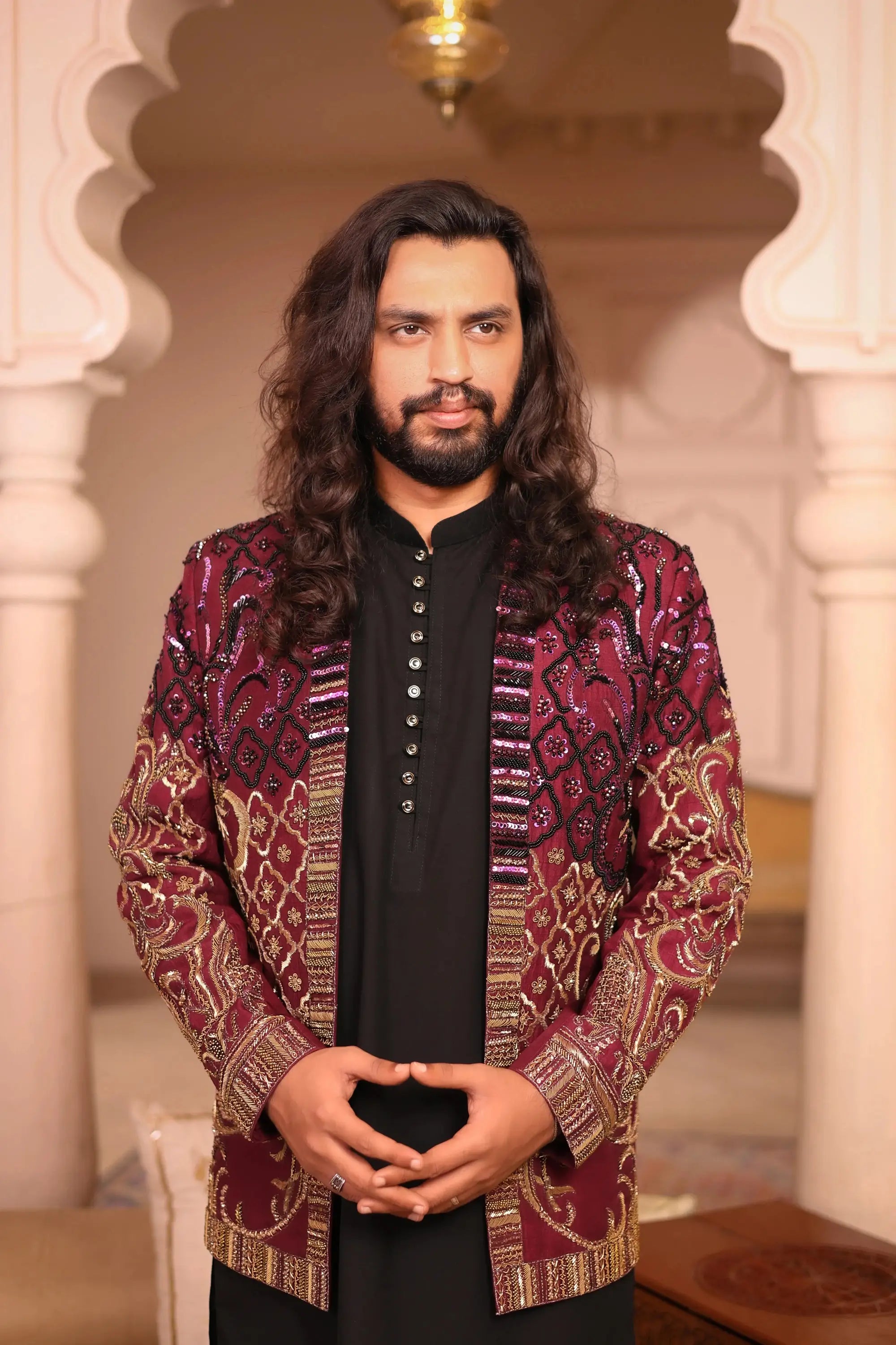 Maroon and gold Mirza jacket with intricate paisley embroidery showcasing detailed craftsmanship