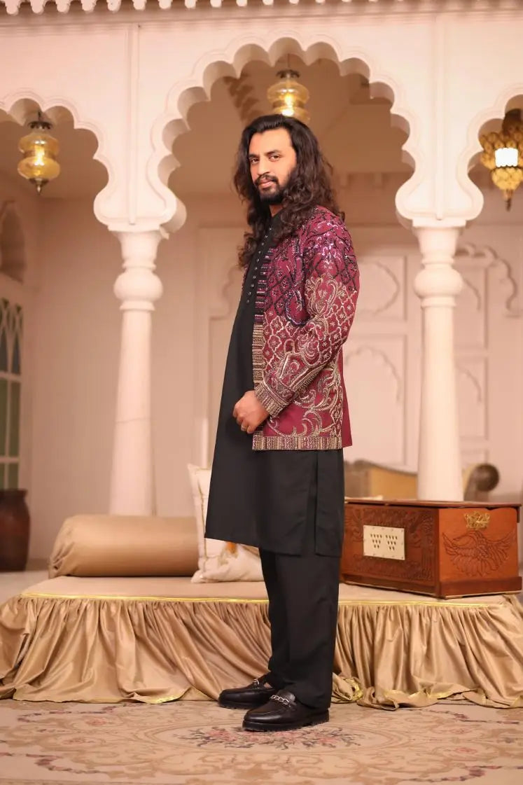A maroon and gold patterned traditional jacket mirza with intricate embroidery detailing