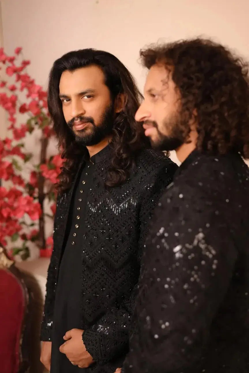 Black sequined nawab jacket with intricate embroidery showcasing detailed craftsmanship and elegant design