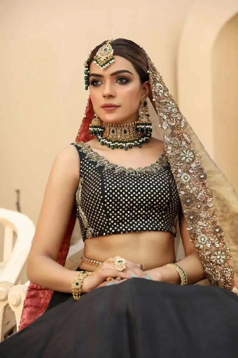 Black beaded crop top nayab with intricate gold embroidery and scalloped neckline by ahsan tariq prince coat collection