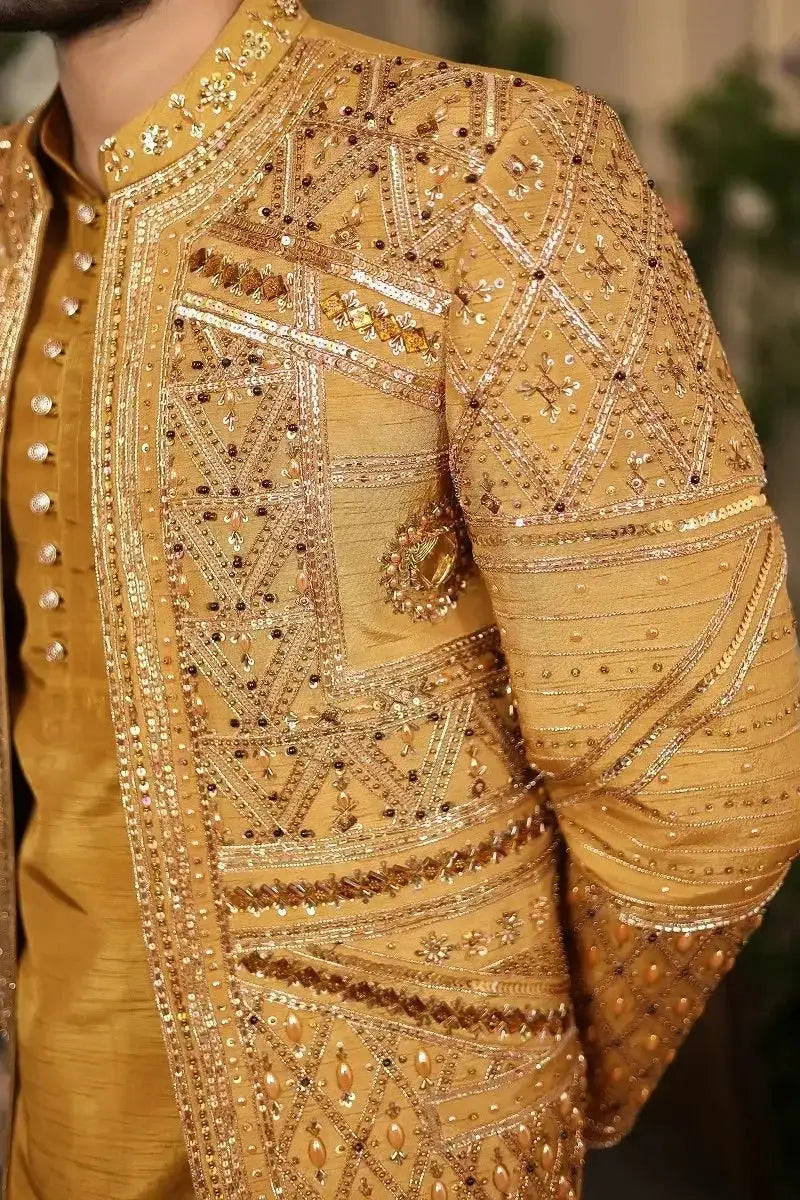 Golden raw silk jacket nishan-e-manzil with intricate geometric embroidery and sparkling sequins