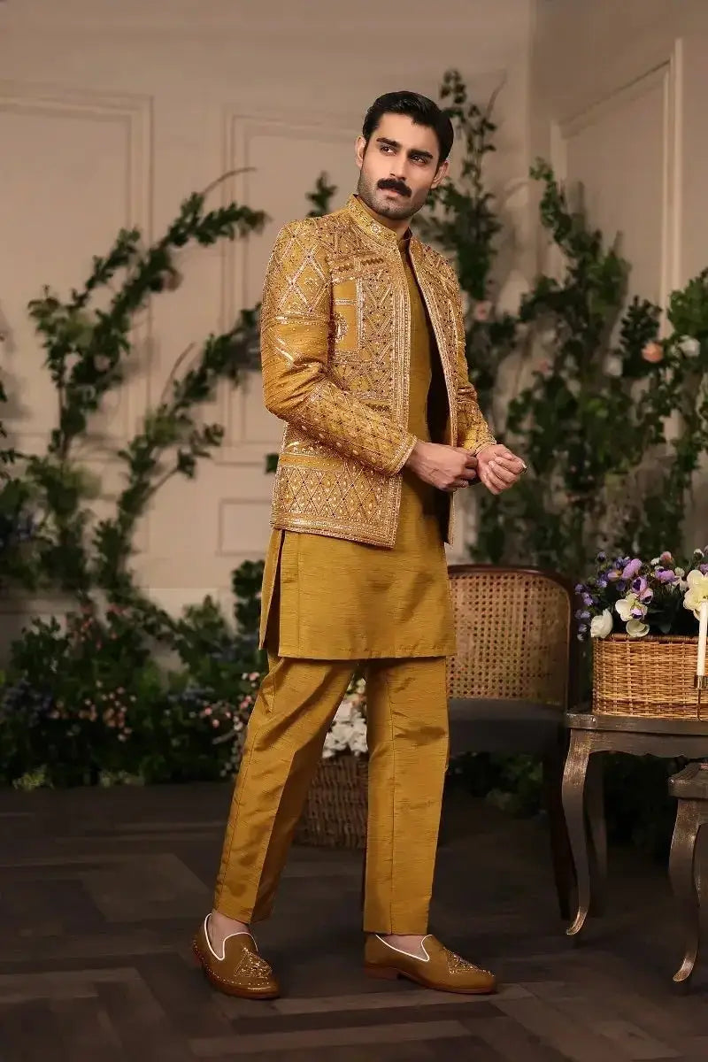 Nishan-e-Manzil golden raw silk sherwani with intricate gold thread embroidery and matching trousers