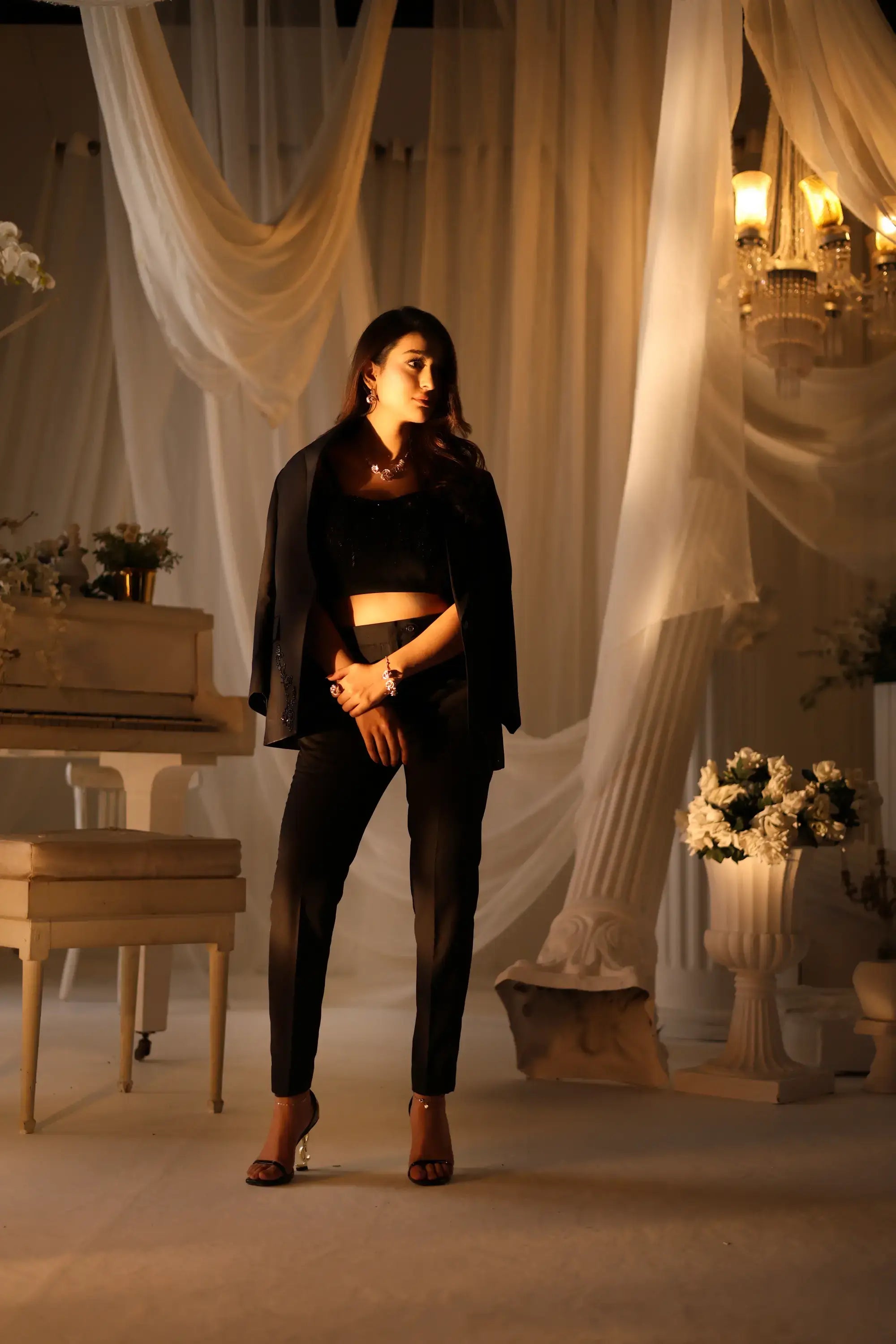 Black cropped top noir éclat by ahsan tariq with sleek fitted design and subtle sheen for stylish wear