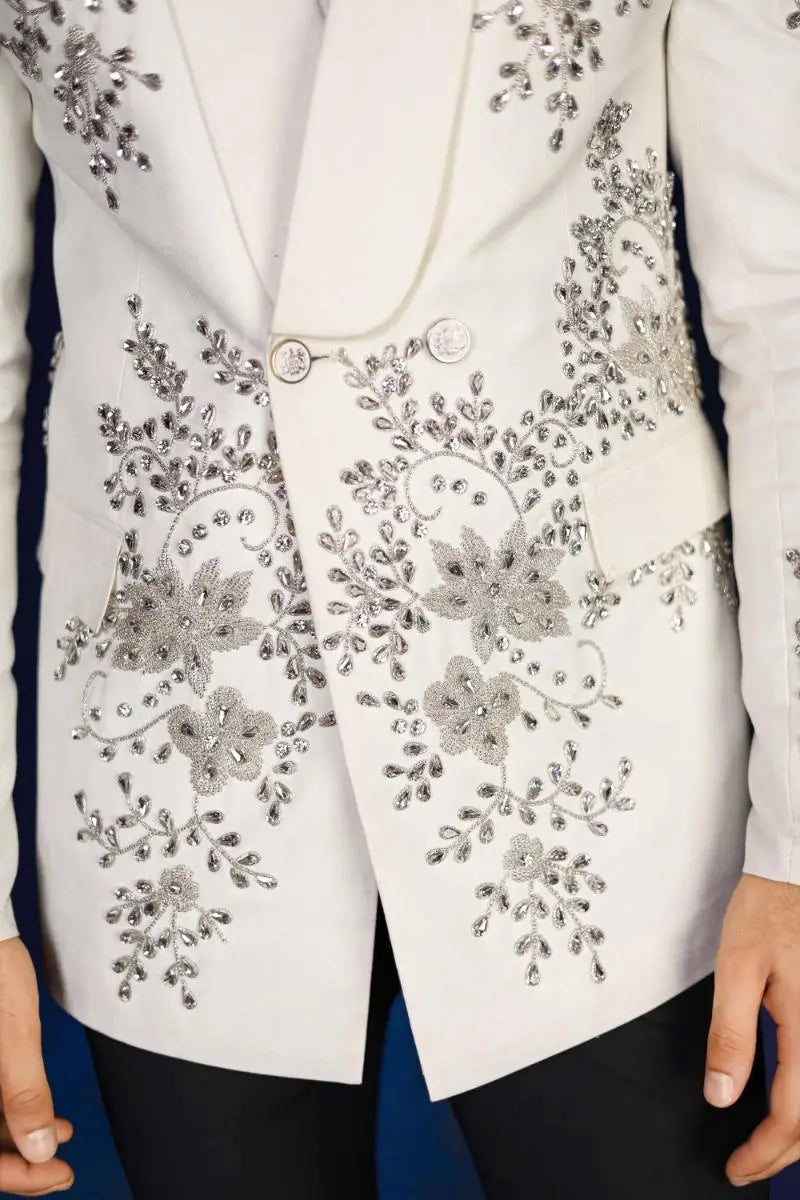 White blazer with intricate silver beaded floral embroidery from notte di lusso ishq eidt26 collection