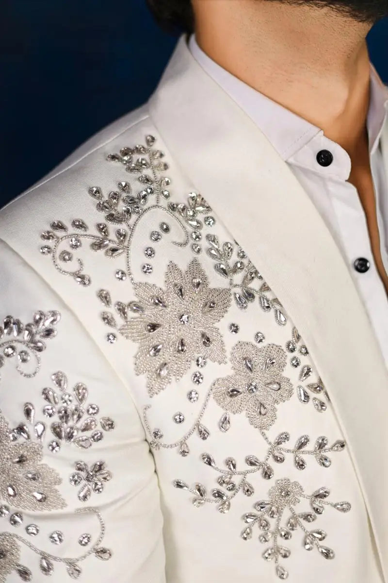 White blazer with intricate silver beading and sequin floral embroidery from notte di lusso ishk eidt 26 collection