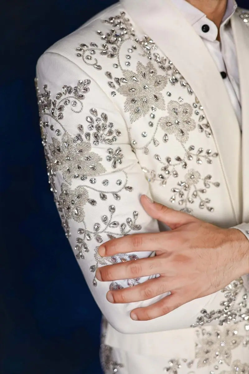 White blazer with intricate silver beading and floral embroidery from notte di lusso ishq eidt26 collection