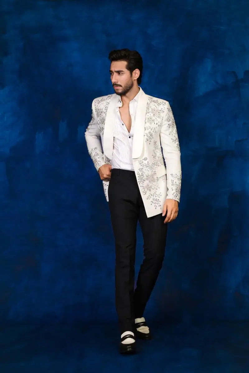 White blazer with intricate silver floral embroidery from notte di lusso collection ideal for festive occasions