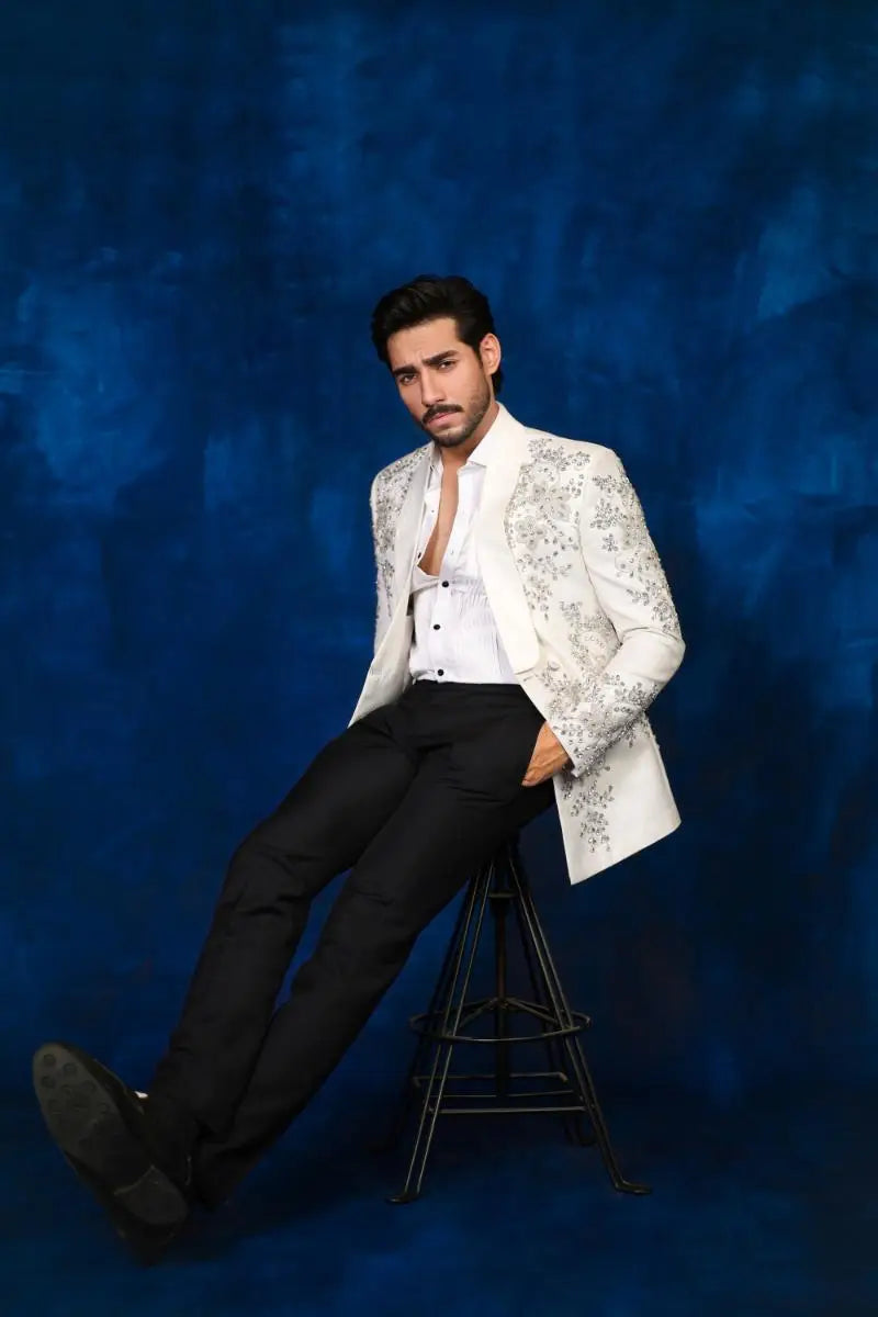 White embellished blazer with intricate silver embroidery from notte di lusso collection ishq eidt 26