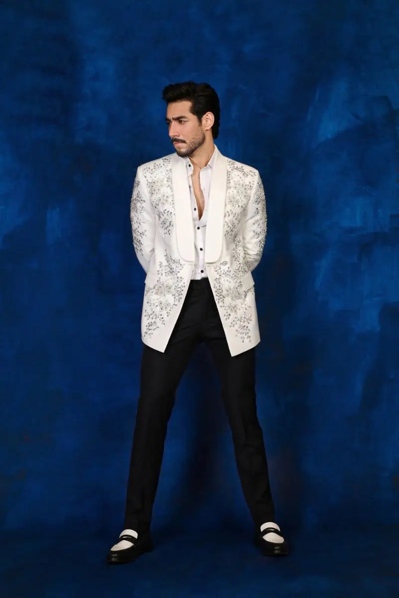 White embellished blazer with intricate silver embroidery from notte di lusso ishq eid t26 collection