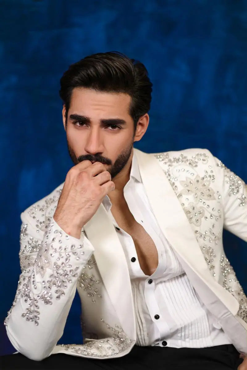 White sequined blazer with intricate silver embellishments from notte di lusso ishq eid t26 collection