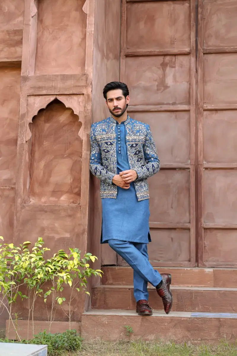 Blue embroidered QALB prince coat with intricate silver thread detailing from Ahsan Tariqs Ishq collection