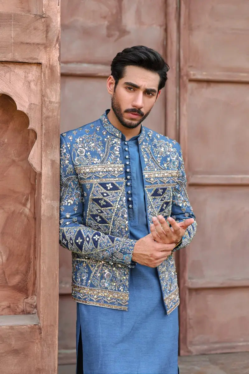 Blue embroidered sherwani with gold and silver thread detailing from ahsan tariqs ishq collection prince coat qalb