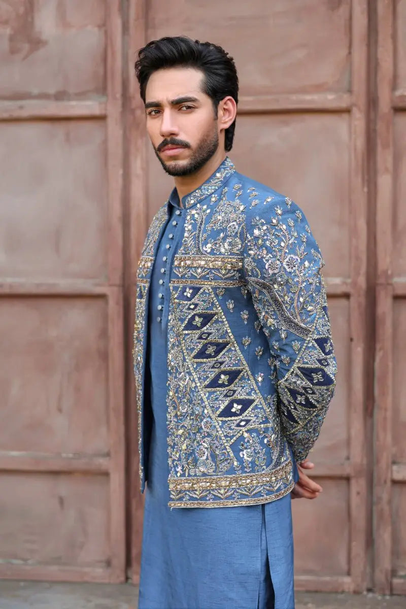 Blue embroidered sherwani with gold and silver thread detailing from ahsan tariqs ishq collection prince coat qalb
