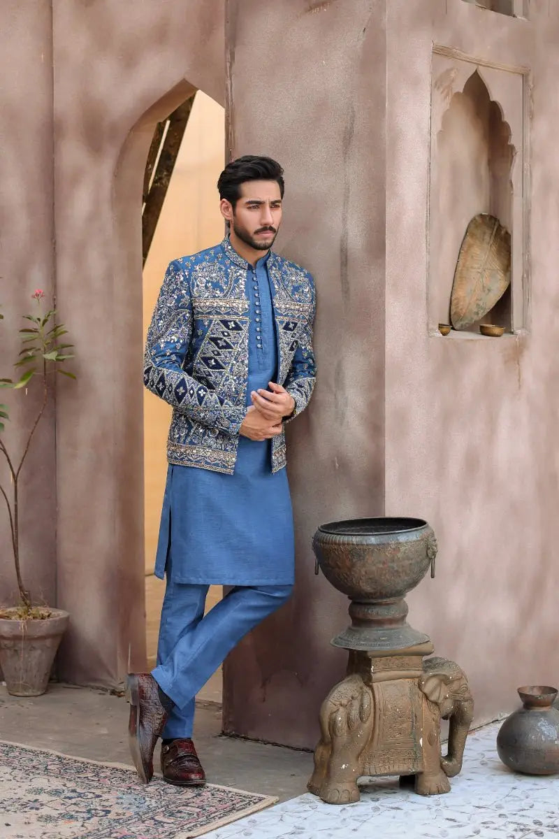 Blue embroidered sherwani from ahsan tariqs ishq collection featuring intricate silver thread detailing prince coat style