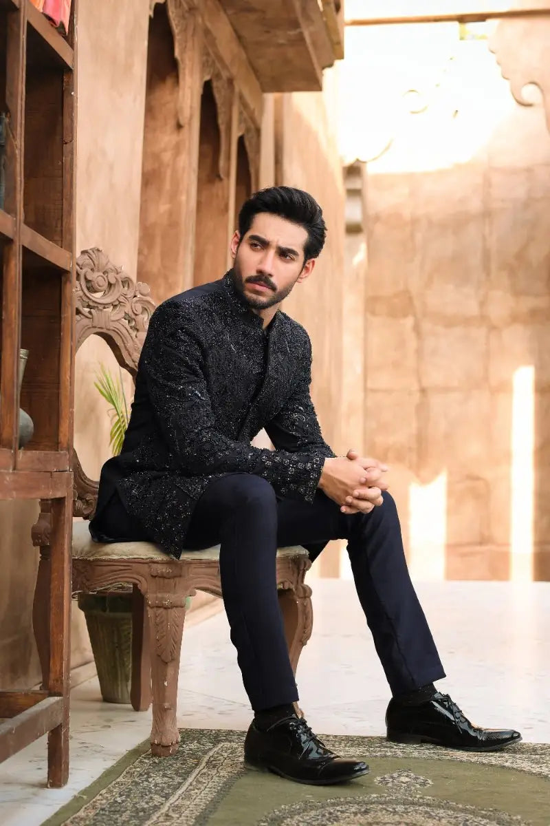 Black formal jacket from qara with intricate silver thread embroidery by ahsan tariq ishq collection