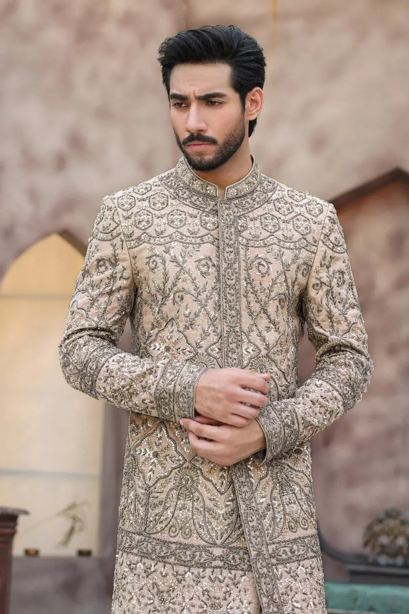 Beige embroidered sherwani with intricate silver thread detailing from ahsan tariqs ishq collection qurb product