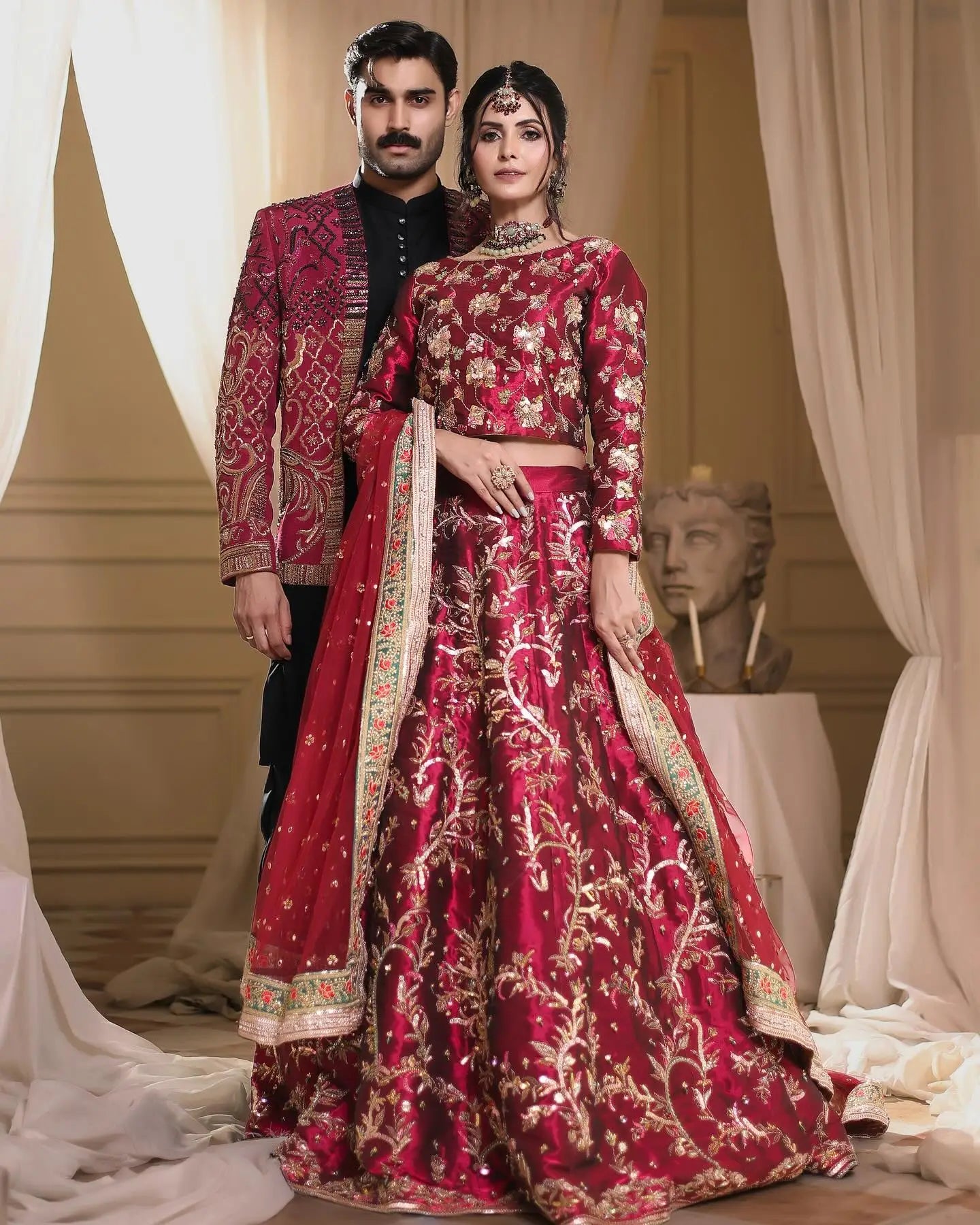 Rang-e-Mahal rich red bridal lehenga with gold paisley embroidery and cropped blouse from romance fall winter collection