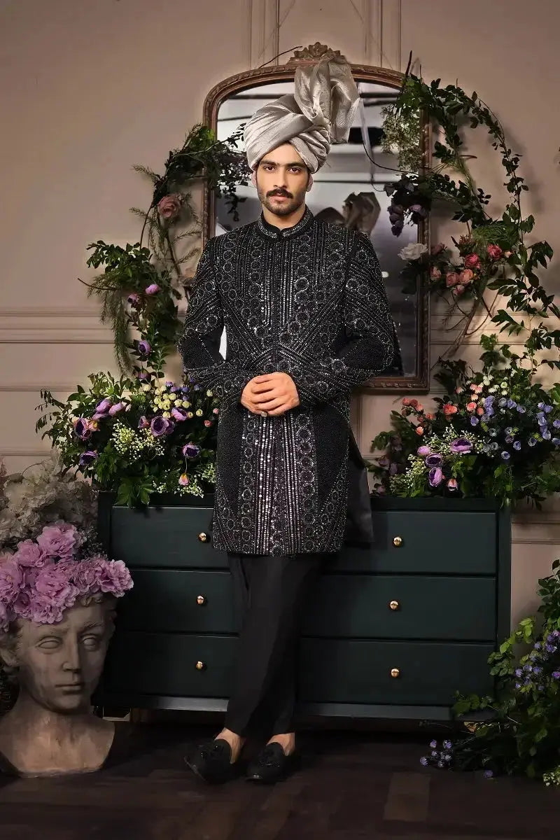 Black embroidered sherwani with silver thread detailing and matching silver turban from ranjeet singh royal collection