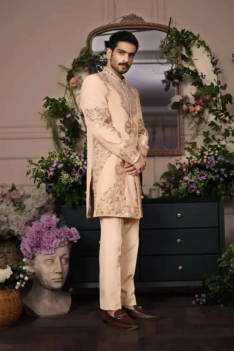 Beige embroidered kurta with intricate gold thread detailing and matching trousers from shairshah collection