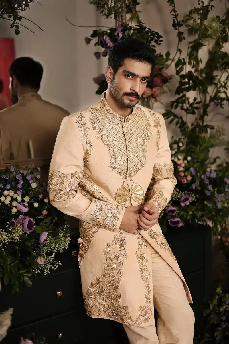 Beige embroidered sherwani shairshah with gold thread detailing and matching belt for traditional occasions