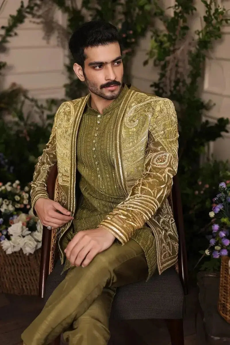 Olive-green embroidered sherawala velvet sherwani with intricate gold threadwork made from raw silk with matching trousers