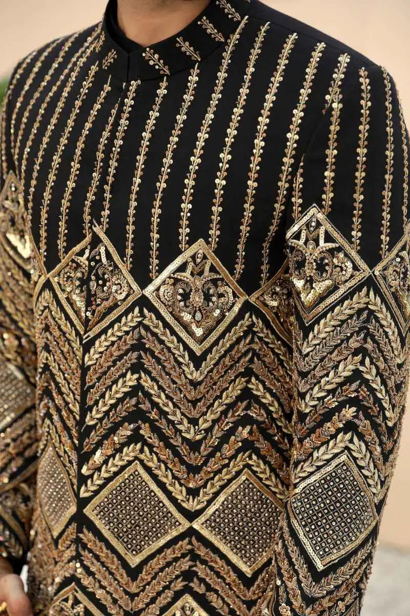 Siyah nishaan black formal shirt with gold and bronze embroidery in geometric and leaf motifs from raqeeb se collection standout piece