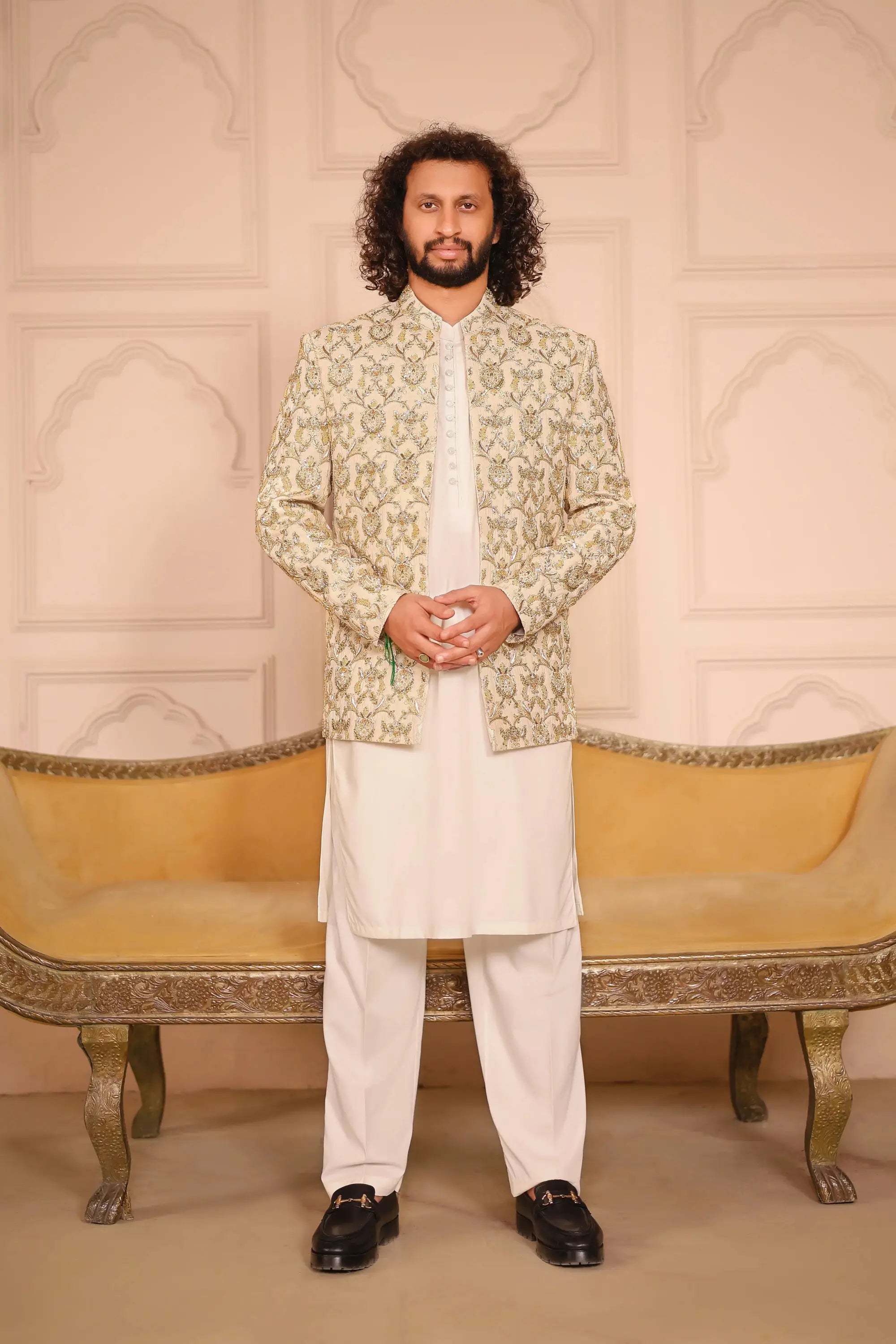 Beige embroidered sultan jacket with intricate gold thread detailing showcasing elegant craftsmanship