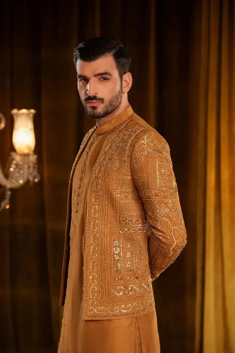 Taimoor gold-toned raw silk sherwani with heavy embellished work in metallic thread and sequin detailing