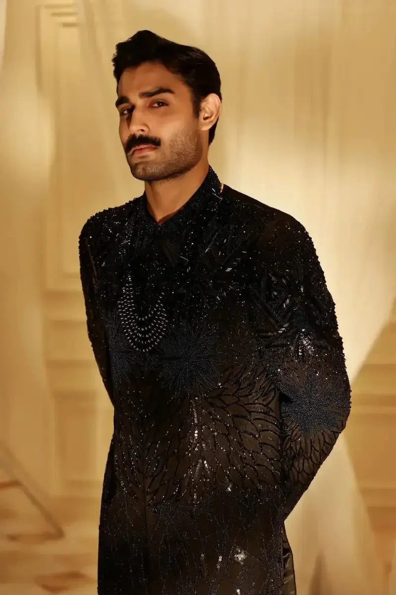 Black sequined sherwani tajdar with intricate beaded embroidery in raw silk for elegant formal wear