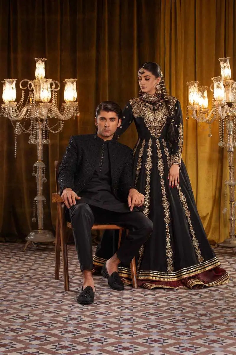 Black and gold embroidered multi-paneled anarkali kalidar with maroon accents from the zar taaj ensemble