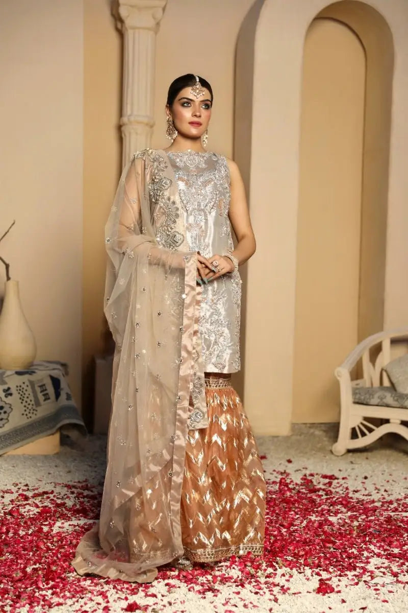 Silver and gold embroidered traditional pakistani outfit zarrin with sheer dupatta designed by ahsan tariq for raqeeb se edit
